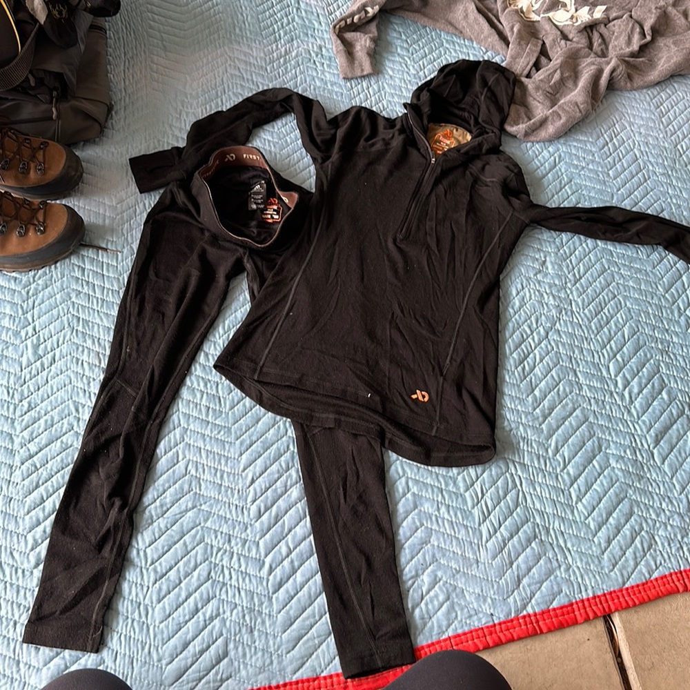 First Lite long Jane top and pant womens  Black 100% Merino Wool